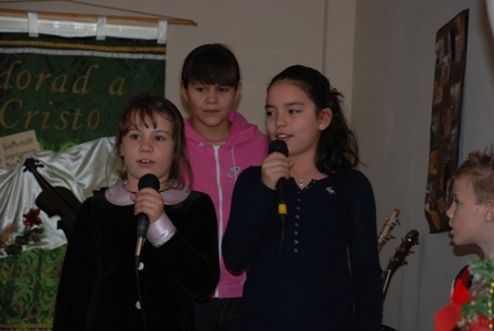 Annelise singing in Christmas presentation